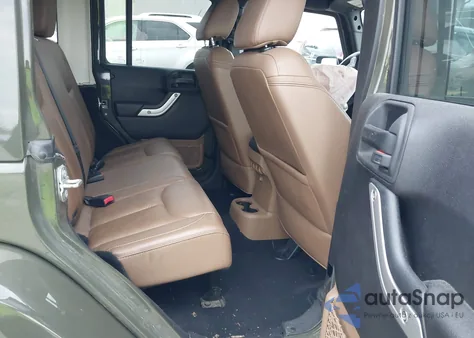 2015 Jeep Wrangler Unlimited Sahara from USA, damaged, VIN 1C4BJWEG8FL552044